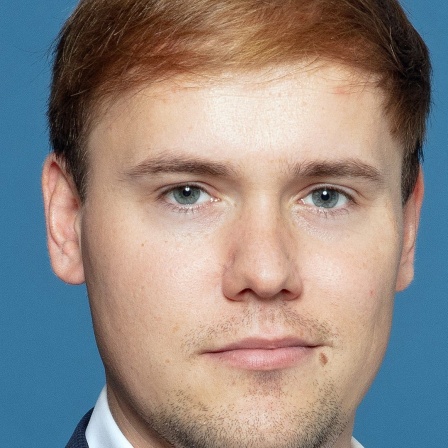 Ein Porträtbild von Alexander Graef Konfliktforscher am Institut für Friedensforschung und Sicherheitspolitik (IFSH).