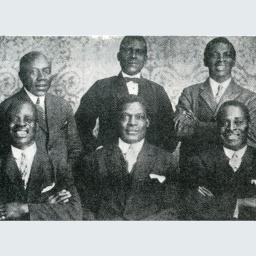 Das Beitragsbild des WDR3 Kulturfeature "Black Power in den Goldenen Zwanzigern" zeigt ein Gruppenporträt mit Louis Brody und Joseph Bilé.