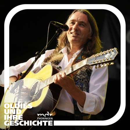 Roger Hodgson, mit Gitarre auf der Bühne, 2012