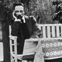 Rainer M. Rilke auf Gartenbank/Foto 1913