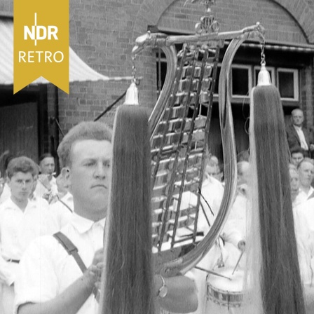 Spielamnnszug, Mann mit Lyra-Glockenspiel.