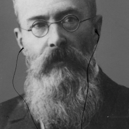 Komonist Nikolai Rimskij-Korsakow mit In-ear-Kopfhörern (Bildmontage).