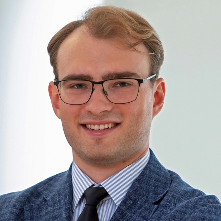 Porträtbild von Mikhail Polianskii vom Leibniz-Institut für Friedens- und Konfliktforschung.
