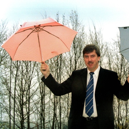 Thomas Herriger (GER/Geschäftführer Knirps GmbH) mit Schirmen aus der Knirps Produktion