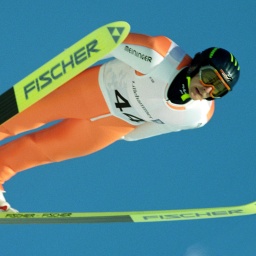 Der deutsche Skispringer Jens Weißflog springt in Lillehammer 1994 zur Goldmedaille. 