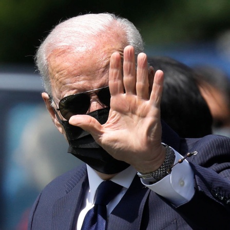 US-Präsident Joe Biden mit schwarzem Mundschutz