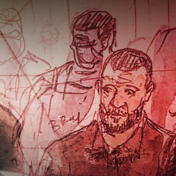 Eingangstüre von Bataclan mit Polizist und Blumensträuße