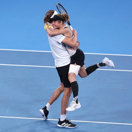 Alexander Zverev und Laura Siegemund jubeln