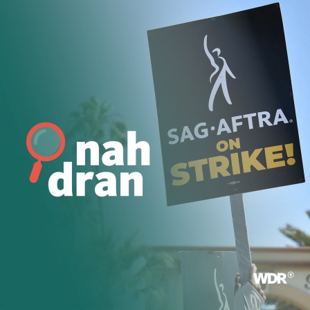 Das Bild zeigt ein Protestschild der Schauspieler in Hollywood, daneben das Logo von Nah dran. 
