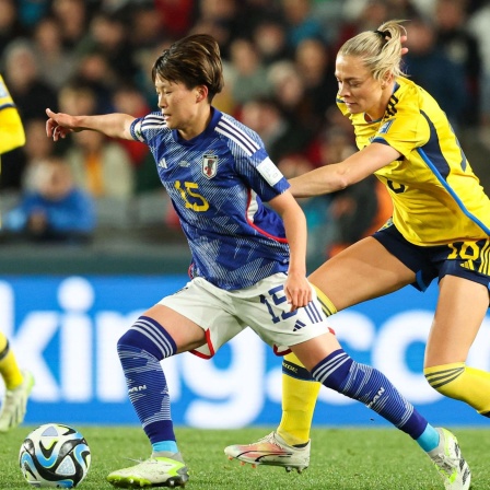 Spielszene: Japan gegen Schweden.