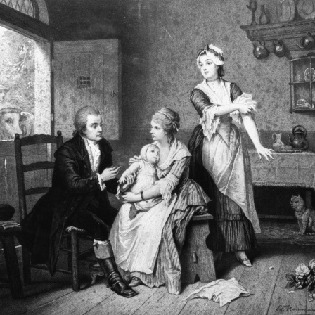 Der Holzstich zeigt "Jenners erste Pockenimpfung" 1796. Ein Arzt impft einen Säugling auf dem Arm der Mutter.