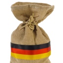 symbolbild: Geldsack mit einer Stoffbanderole in den deutschen Nationalfarben.